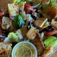Greek Salad · Green salad, feta, black olive, artichoke hearts, red onion, house garlic vinaigrette.