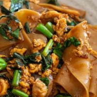Pad See Ew · Stir-fried flatted rice noodle with chicken or pork, egg, Chinese broccoli, sweet soy sauce