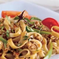  Kee Mow*(Drunken Noodle)  · Stir-fried flatted rice noodle with chicken or pork, Thai Chili, fresh basil