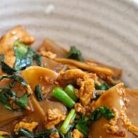  Pad See Ew · Stir-fried flatted rice noodle with chicken or pork, egg, Chinese broccoli, sweet soy sauce