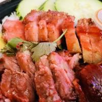 Kow Moo Dang Moo Krob · Red BBQ pork and crispy pork over rice