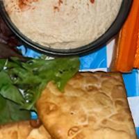 Abc Hummus Dip & Pita Bread · Housemade Hummus Served With Warm Pita Bread and Veggies