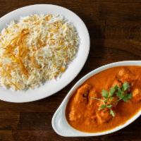 Chicken Tikka Masala · Barbecued Chicken Breast Simmered In A Creamy Tomato Sauce. Served with Rice.