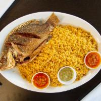 Dry Rice With Fried Tilapia Fish · Dry race season race served with Fried fish