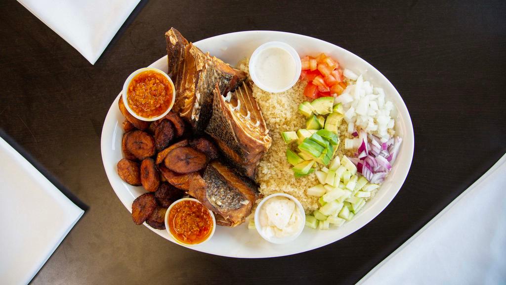 Attieke With Cassava Fish And A Side Of Plantain/Potatoes · Acheke, also spelled attiéké or akyeke, is a dish made from cassava, and is a popular and traditional cuisine in West Africa served with plantains fried fish