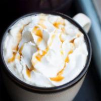 Caramel Macchiato · A layered coffee drink starting with vanilla on the bottom then steamed milk and marked with...