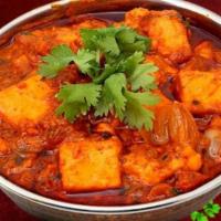 Tikka Masala · Fresh marinated veggies / paneer cooked with fresh tomatoes and onion-based sauce, herbs and...