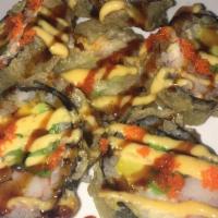 Samurai Roll · White fish, avocado, crab, asparagus, deep fried with spicy mayo, eel sauce, caviar, scallion.