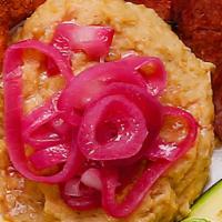 Mangu / Mashed Plantains  · With your selection of fried cheese, scrambled eggs, fried eggs, salami and sausage. 
Con su...