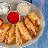 Burrito Bites · A Callahan’s favorite. Beef, beans and cheddar cheese rolled into a flour tortilla, lightly ...