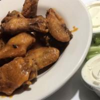 Chicken Wings · 9 Large fresh chicken wings, fried to perfection and basted with your choice of sauce. Serve...