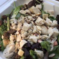 Almond Chicken · Mixed greens, grilled chicken, tomato, almonds, shaved Parmesan, and croutons