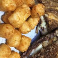 Patty Melt · Traditional patty melt, with grilled onions and topped with Swiss cheese on marble rye.