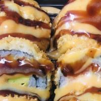 Godzilla Roll · Spicy tuna and avocado fried tempura style with unagi sauce spicy sauce masago-delicious!.