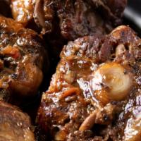 Stew Oxtail (Serves 4-6) · Marinated 24 hours to absorb the tasty spices and herbs, browned and slow cooked for hours f...