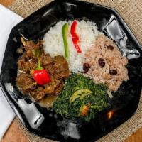 Curry Goat · Slowly simmered in flavors of curry, mixed spice, tomatoes, onions, garlic, and herbs.
