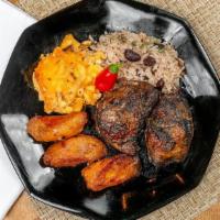 Jerk Chicken · Marinated for 24 hours, and bursting with flavor. Served with tropical bites Caribbean signa...