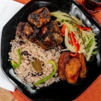 Caribbean Stew Oxtail · Marinated 24 hours to absorb the tasty spices and herbs, browned and slow cooked for hours f...
