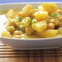 Potatoes & Chick Peas (Channa & Aloo) · A savory, herbal Trinidadian chickpea-and-potato curry is an island adaptation of a common n...
