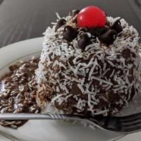 Chocolate Bacardi Rum Cake · Luscious, dark, moist chocolate cake soaked in rum sauce, with real coconut flakes sprinkles.