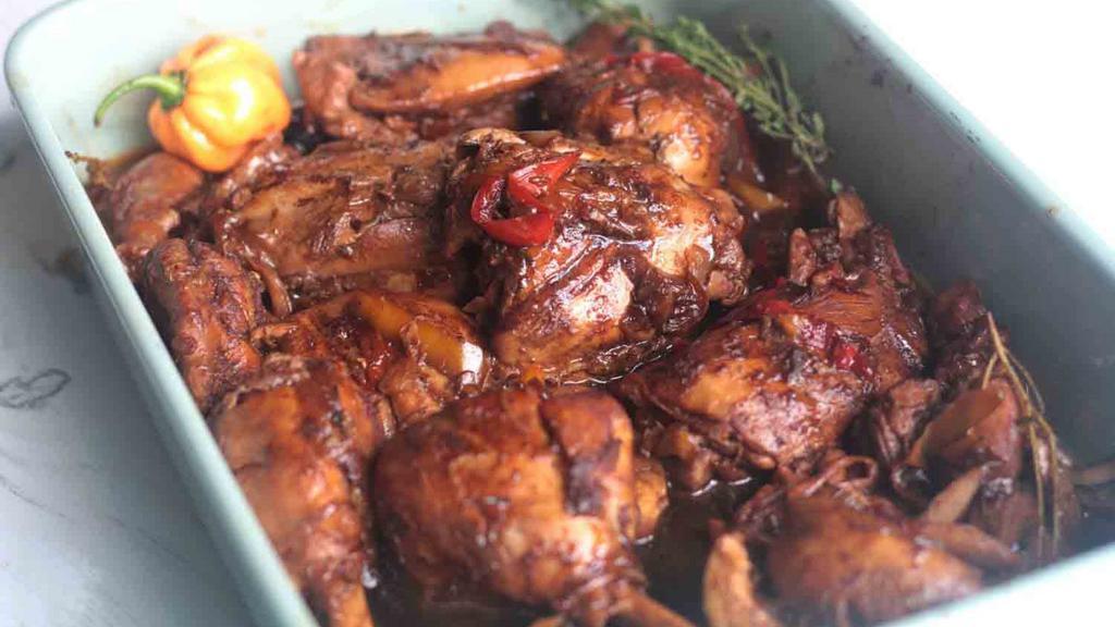 Family Size Stew Chicken · 8 Pieces of slow cooked Stewed Chicken, w/ your choice of rice and two sides
