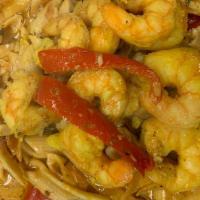 Rasta Pasta W/ Caribbean Curried Shrimp · Our original Caribbean style Curry Shrimp placed on a bed of creamy penne pasta seasoned wit...