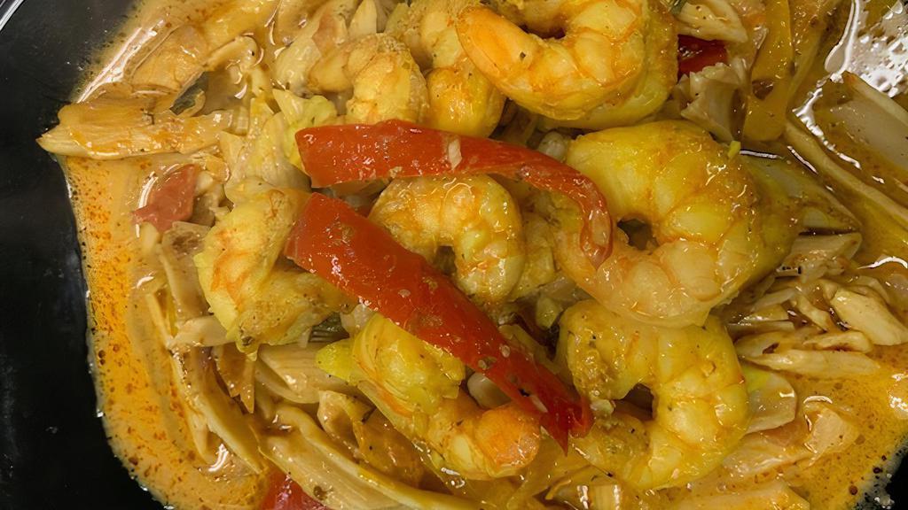 Rasta Pasta W/ Caribbean Curried Shrimp · Our original Caribbean style Curry Shrimp placed on a bed of creamy penne pasta seasoned with jerk spices and tossed with colorful bell peppers.