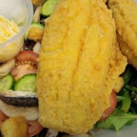 Fish Salad · Our world famous fried fish over garden fresh spring mix salad