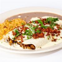 Chori Burritos · Two burritos filled with grilled chicken and onions. Smothered in our special white queso di...