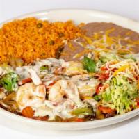 Pollo Los Cabos · Grilled chicken breast topped with grilled shrimp, mushrooms, onions and our special white q...