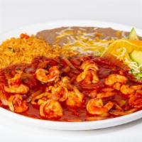 Camarones A La Diabla · Shrimp, onions and mushrooms sautéed in butter and our tasty red sauce. Served with tortilla...