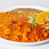 Camarones Al Mojo De Ajo · Shrimp and mushrooms sautéed in a tasty buttery garlic sauce and spices. Served with tortill...