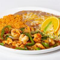 Camarones Rancheros · Shrimp sautéed in a ranchera sauce with onions, mushrooms, tomatoes and bell peppers, served...