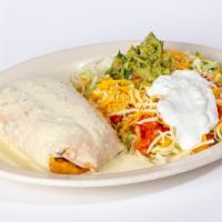 Chimichanga  Grande · Rice , beans and your choice of filling inside a flour tortilla. Topped with white queso dip...