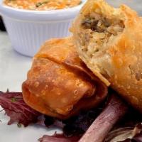 Order Of Boudin Eggrolls · Deep Fried Eggroll filled with Boudin Rice and pepper jack cheese.