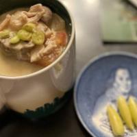 Tom Kha · Chef Recommend.  Galangal, lemongrass, kaffir leaves, mushroom, onions tomato, lime juice, a...