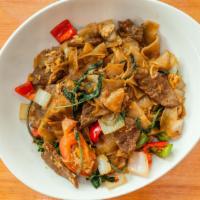 Drunken Noodle · Chef Recommend. Stir-fried wide rice noodles with Thai chilli, egg, onion, bell pepper, toma...