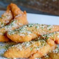 Boneless Wings · Breaded chicken fingers tossed in your favorite sauce served with celery sticks and ranch or...