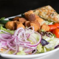 Small House Salad · Iceberg mix garnished with sliced red onions, grape tomatoes, cucumbers and croutons. Served...