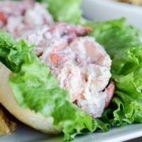 Lobster Roll · 100% real lobster lightly tossed in mayonnaise served in a grilled torpedo roll with green l...