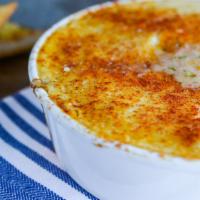 Shepherd'S Pie · Ground beef in gravy layered with fresh corn and our homemade mashed potatoes. Baked and ser...