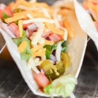 2 Shrimp Tacos · Cajun grilled shrimp in soft flour tortilla with lettuce, shredded cheese, chipotle sauce an...