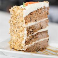 Carrot Cake Slice · A fresh blend of carrots with walnuts, raisins, and spices, glazed with rich cream cheese ic...