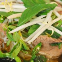 Phở Tai Chin · Pho with thinly slice eye round steak and well done brisket.