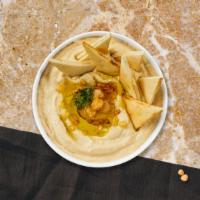 Hummus Plate · A mixture of mashed garbanzo beans, lemon juice and tahini, and garlic served with pita bread.