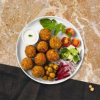Falafel Freak · (Six pieces) Baked and fried mixture of garbanzo beans, fava beans, coriander, cumin, parsle...