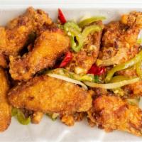 10 Piece Crispy Wings Black Pepper · Hot and spicy.