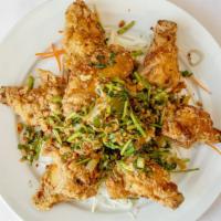 10 Piece Crispy Wings Thai Garlic Sauce · Hot and spicy. Has a taste of lime and cilantro.
