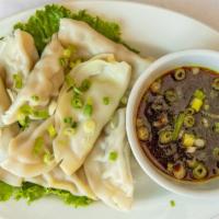 8 Piece Peking Ravioli · Steam or fried ravioli with pork served with special ginger soy sauce.