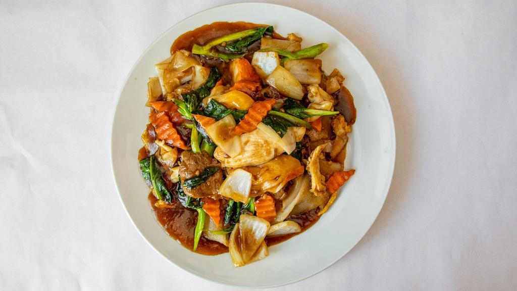 Cambodian Style Stir Fried Cantonese Noodle · Prepared with flat wide rice noodle, Chinese broccoli, peapod, carrot and onion.